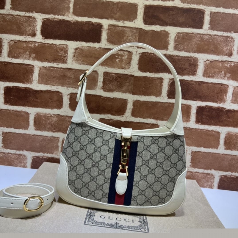 G*u*i top handle bags